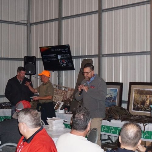 Announcing raffle winners at Ducks Unlimited 2020 event